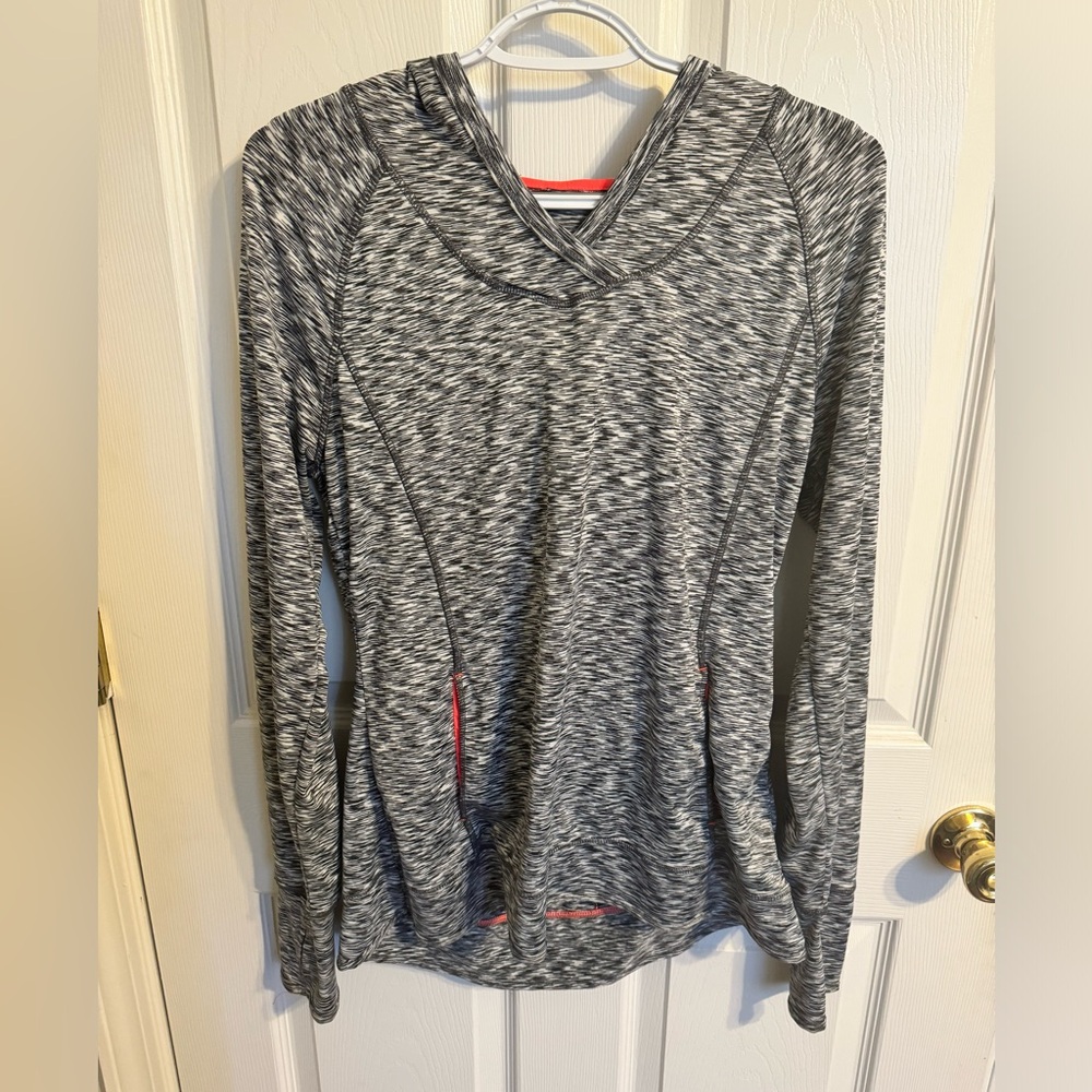 “Tangerine” athletic shirt with hood, back zipper, pockets, & thumb holes